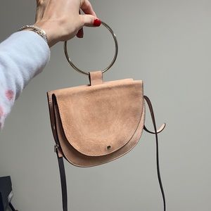Theory circle handle suede purse. Light pink